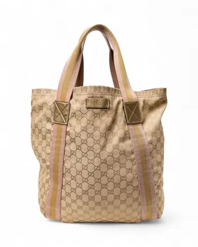 Gucci Soft Vertical Gg Supreme Shopper In Gold In Brown