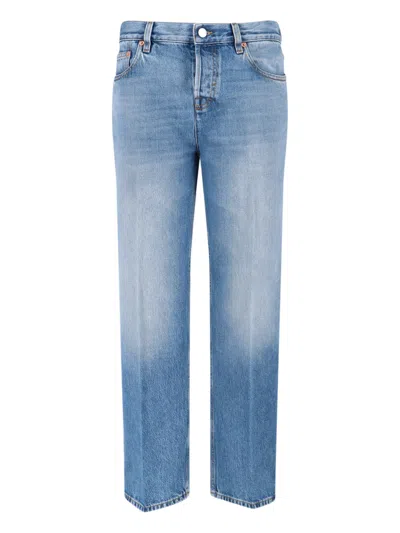 Gucci Blue Jeans With Logo Patch On The Rear And Faded Effect In Denim Woman