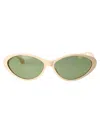 Gucci Cat Eye Sunglasses In Gold
