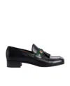 Gucci Tassel-trim Loafers In Black