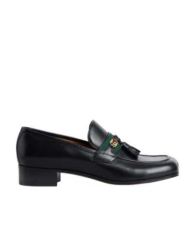 Gucci Tassel-trim Loafers In Black