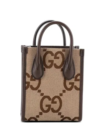 Pre-owned Gucci Vertical Tote Jumbo Gg Canvas Mini Crossbody Bag In Brown