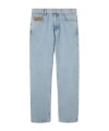 Gucci Men Light Blue Jeans With Gg Detail On The Pocket And Logo Patch On The Rear In Denim Man In Blue