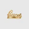 Gucci Wide Ring With  Script In Gold-toned Metal