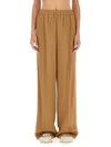 Gucci Women Beige Pants With Elastic Drawstring Waist In Gg Canvas Woman In Brown