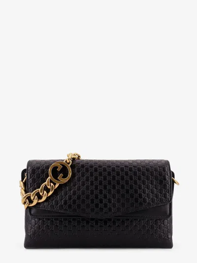 Gucci Women Leather Crossbody Bag With Embossed Gg Motif In Black