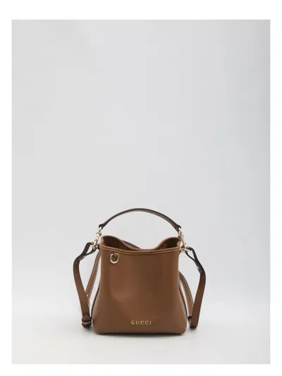 GUCCI WOMEN'S MINI GG EMBLEM BUCKET BAG BROWN | 815118AAEC2