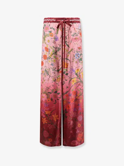GUCCI GUCCI WOMEN SILK TROUSERS WITH GUCCI FLORA PRINT