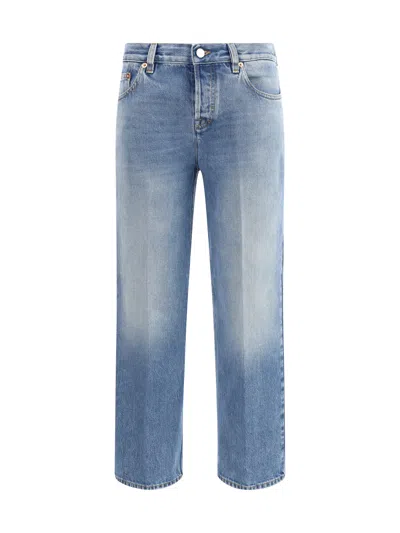 Gucci Blue Jeans With Logo Patch On The Rear And Faded Effect In Denim Woman