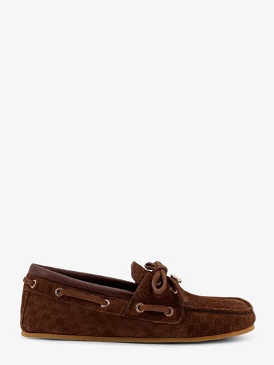 Gucci Women Suede Loafers With All-over Gg Logo In Brown