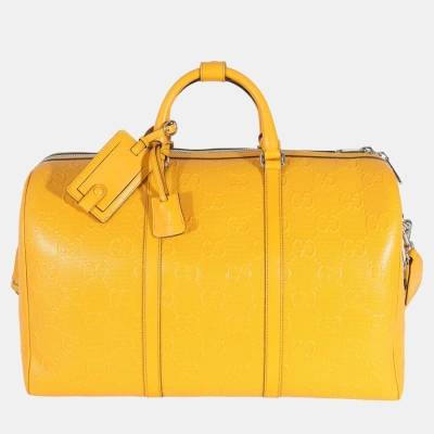 Pre-owned Gucci Yellow Embossed Perforated Calfskin Gg Convertible Duffle