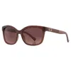 Shop Guess Brown Resin Sunglasses
