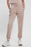 Guess Couture Crystal Logo Embellished Velour Joggers In Skin Shadow