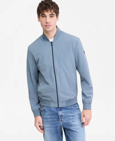 Guess Men's Packable Stretch Bomber Jacket In Blue