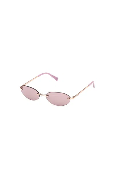 Guess Small Oval Metal Sunglasses In Gold
