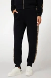 Guess Studs Logo Sweatpants In Jet Black
