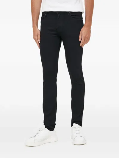 Guess Usa Chris Logo-patch Jeans In Black