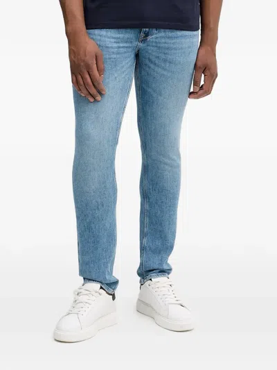 Guess Usa Finnley Logo Patch Jeans In Blue