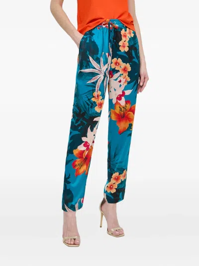 Guess Usa Floral Trousers In Orange