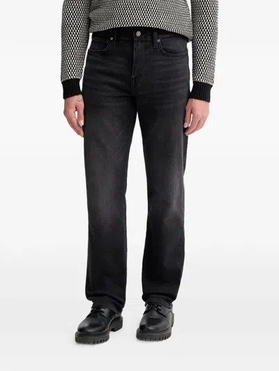 Guess Usa Logo-patch Jeans In Black