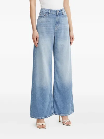 Guess Usa Logo-patch Jeans In Blue