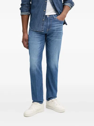 Guess Usa Logo-plaque Jeans In Blue
