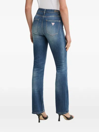 Guess Usa Logo-patch Pocket Jeans In Blue