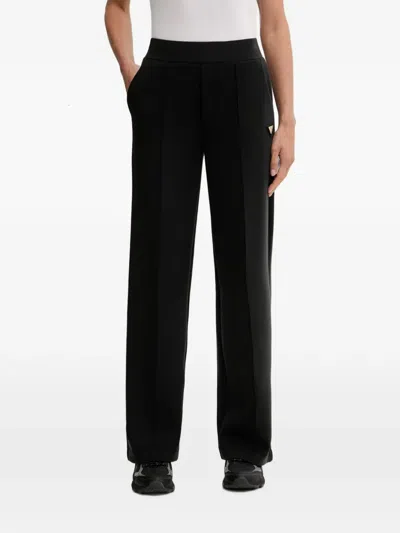 Guess Usa Logo-plaque Wide-leg Track Pants In Black