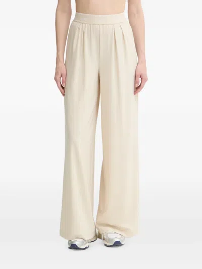 Guess Usa Logo-waistband Pleated Trousers In Neutral