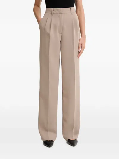 Guess Usa Pleated Logo-plaque Trousers In Brown