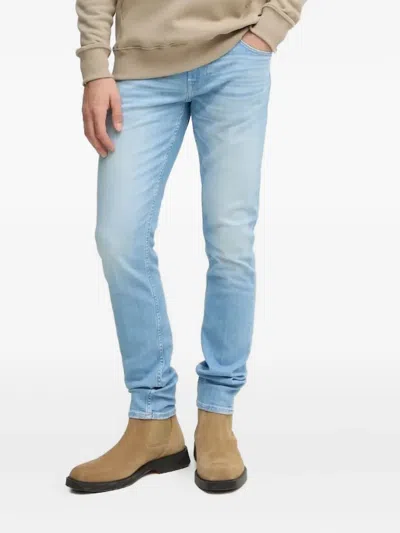 Guess Usa Triangle-logo Jeans In Blue