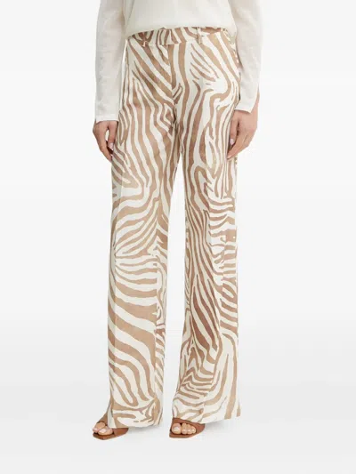 Guess Usa X Marciano Animal-print Trousers In Neutral
