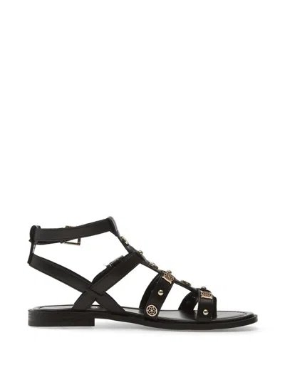 Guess Usa Yazza Logo-plaque Leather Flat Sandals In Black