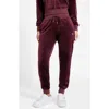 Guess Velvet Joggers In Burgundy