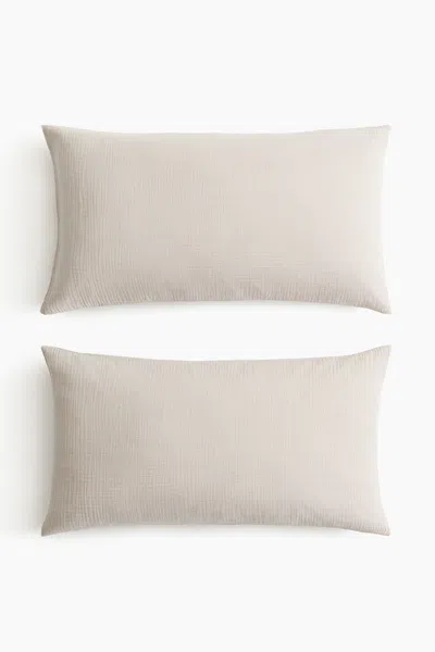 H&m 2-pack Cotton Muslin Pillowcases In Light Taupe