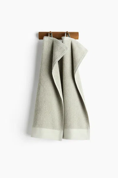 H&m 2-pack Cotton Terry Guest Towels In Green