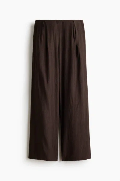 H&m Crinkled Viscose-blend Trousers In Brown