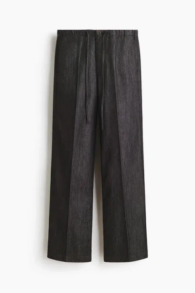 H&m Denim Drawstring Trousers In Black