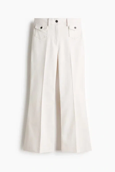 H&m Flared Ankle-length Trousers In White