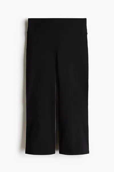 H&m Flared Capri Sports Leggings With Softmove In Black