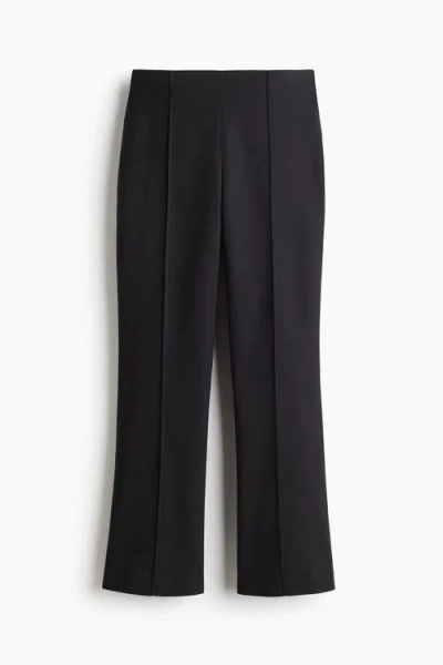 H&m Flared Crease-front Trousers In Blue