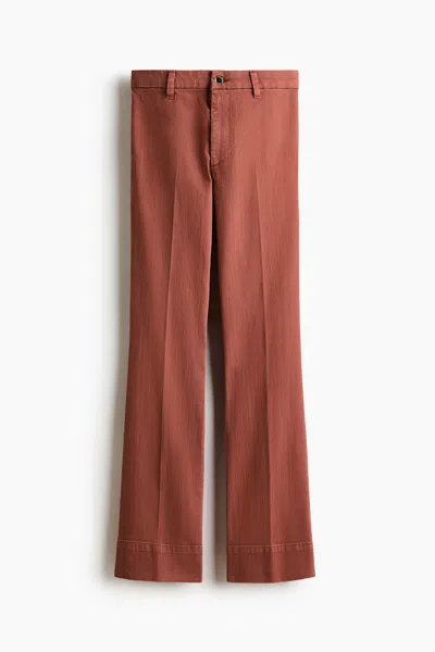 H&m Flared High Jeans In Orange