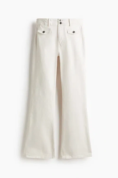 H&m Flared High Jeans In Neutral