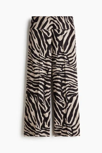 H&m Flared Linen-blend Trousers In Black