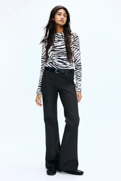 H&m Flared Low Jeans In Black