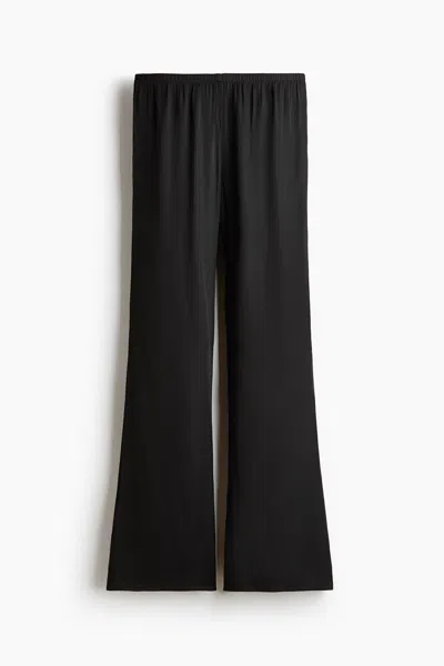 H&m Flared Satin Pants In Black