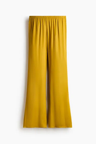 H&m Flared Satin Pants In Gold