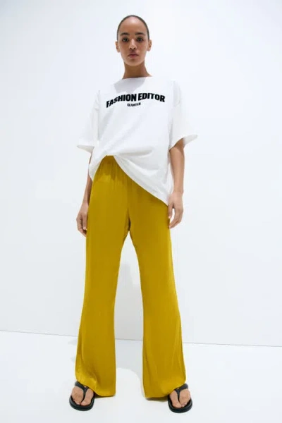 H&m Flared Satin Trousers In Yellow