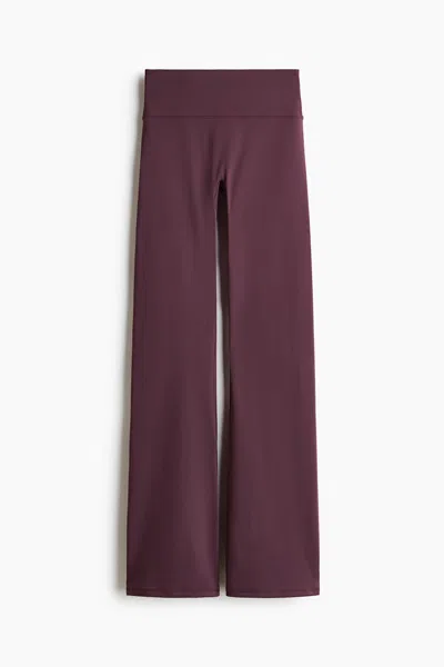 H&m Flared Yoga Leggings With Softmove In Burgundy