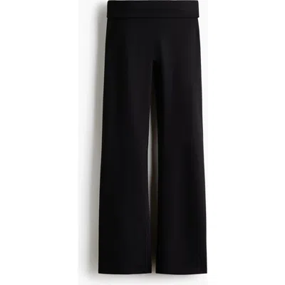 H&m Flared Yoga Leggings With Softmove In Black